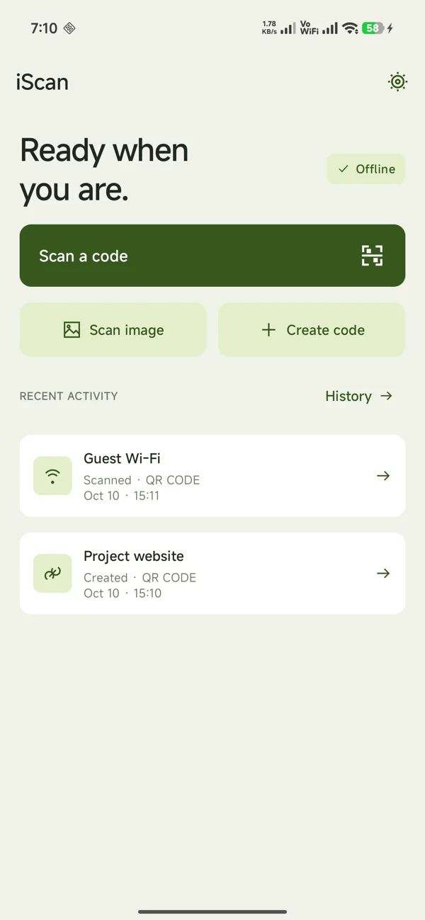 Light-mode QR and barcode scanner home with camera and image scan entry points